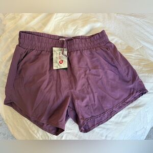 Baleaf Women's Purple Running Shorts size Medium 4”